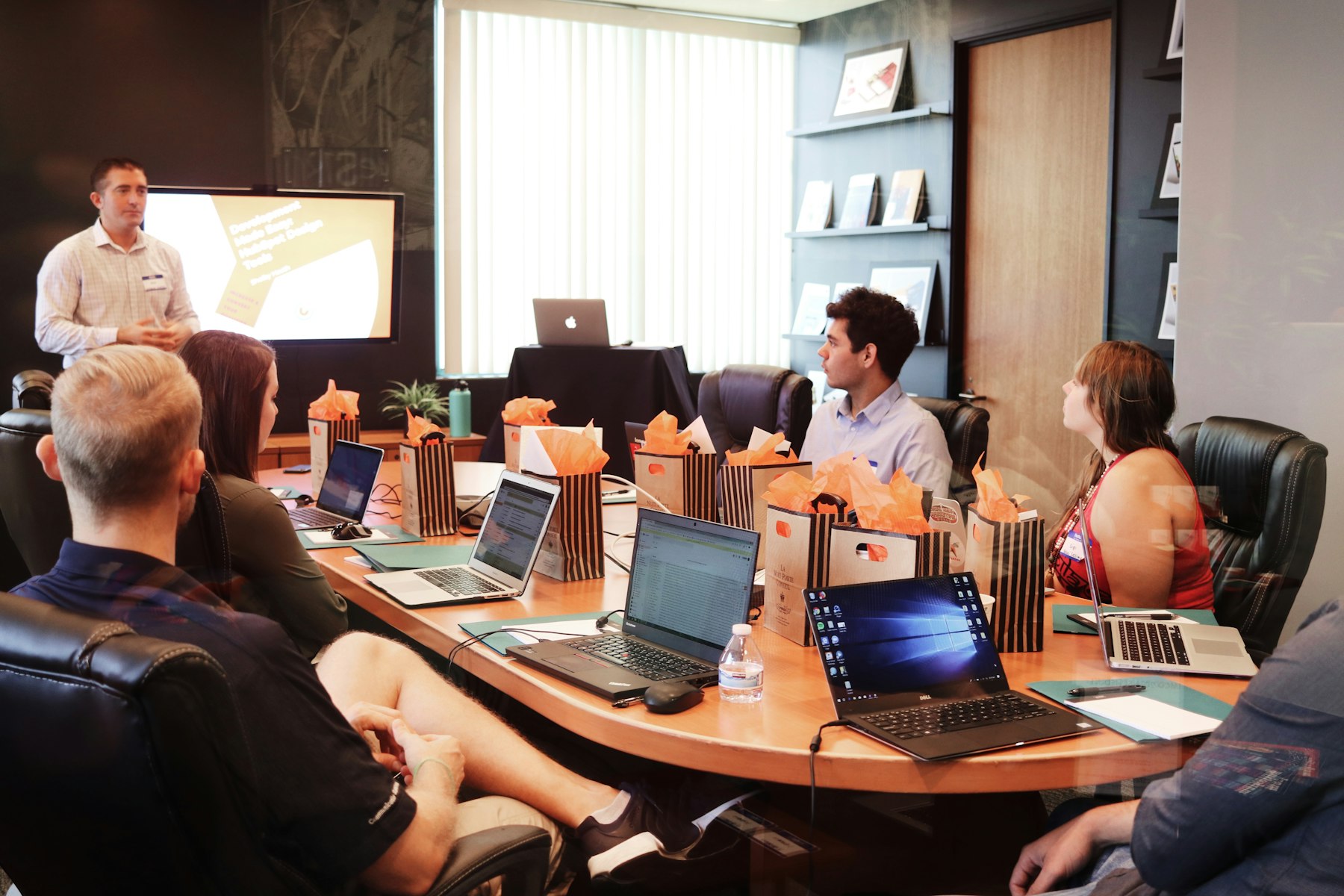 A growth team reviewing a campaign presentation together